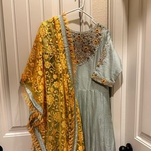 Indian outfit, sage green color with yellow dupatta